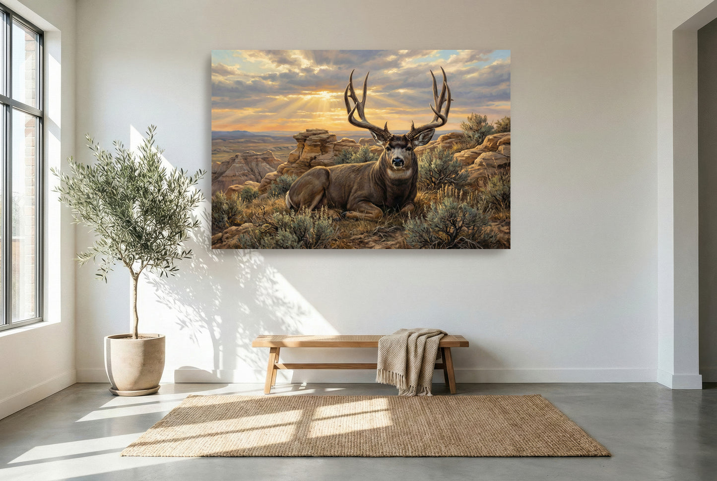 gallery wrapped canvas wildlife wall art of a badlands mule deer bedded on a rimrock ledge