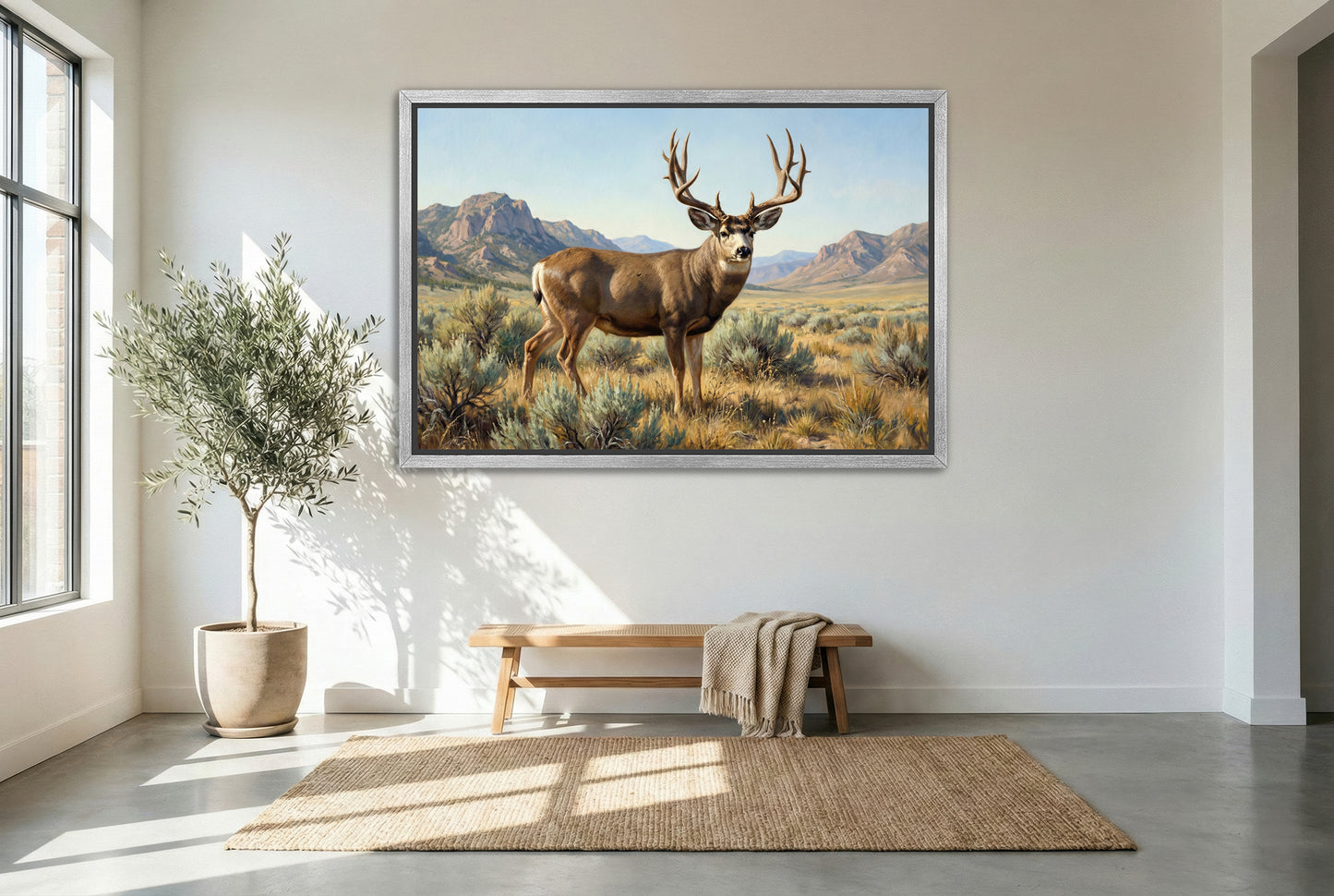 silver floating framed canvas big game artwork of a big mule deer bumped from his midday bed drainage move
