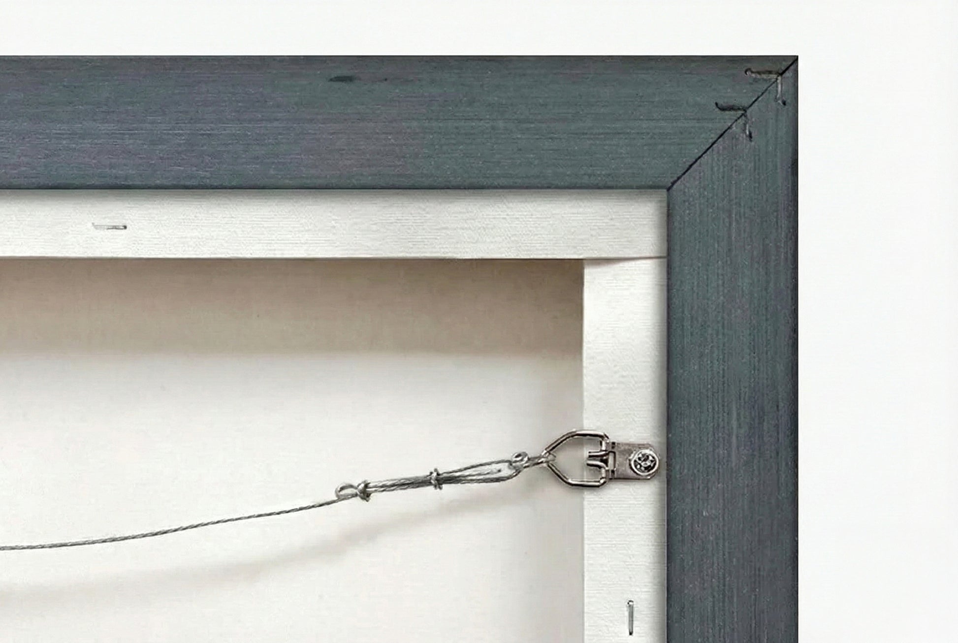 Back of wildlife canvas art showing installed hanging wire ready to display