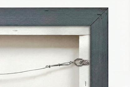 Back of wildlife canvas art showing installed hanging wire ready to display