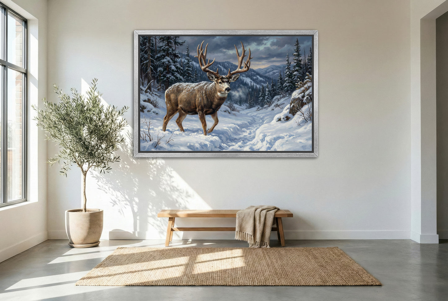 silver floating framed canvas big game artwork of a mule deer buck migrating through heavy snow out of high country mule deer buck