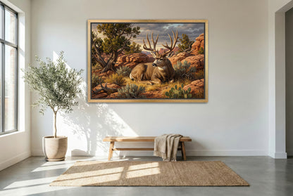 gold floating framed canvas trophy room art of a mule deer buck bedded desert red rock country