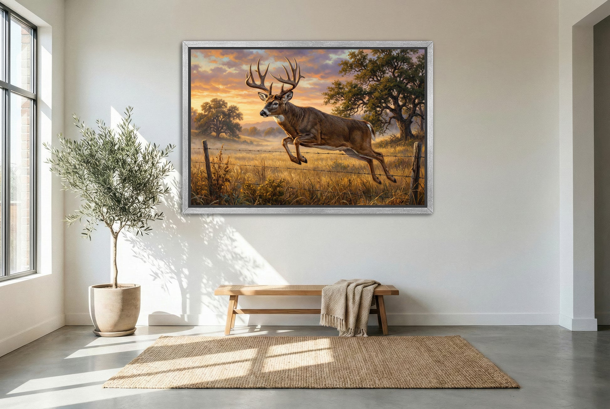 silver floating framed canvas big game artwork of a whitetail buck fence jumper at sunrise